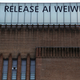 A sign along the top of the Tate Modern art gallery reads "'Release Ai Weiwei" in London April 8, 2011